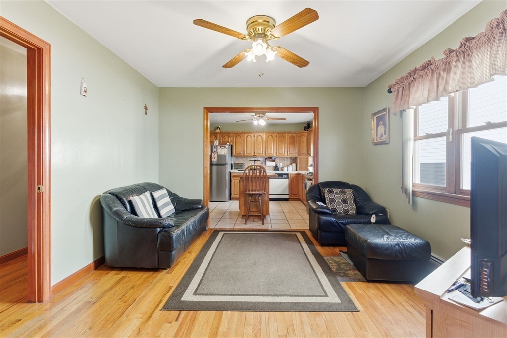 71-73 Oak Street Somerville, MA 02143 - Photo 7 of 42 a living room with furniture rug and window