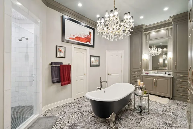 a utility room with sink dryer and washer