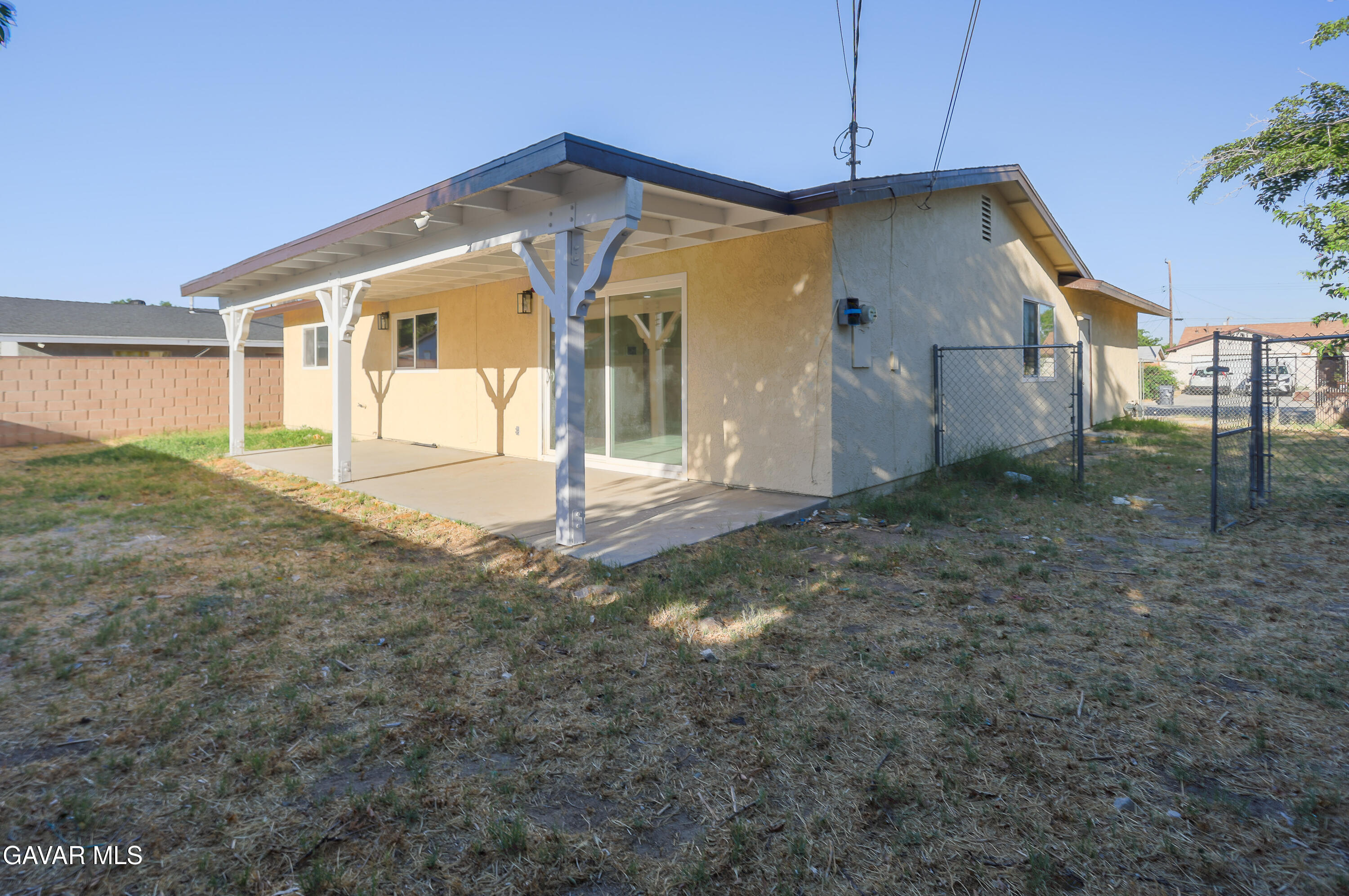 3340 West Roxbury Street Rosamond, CA 93560 - Photo 20 of 20 a front view of a house with a yard