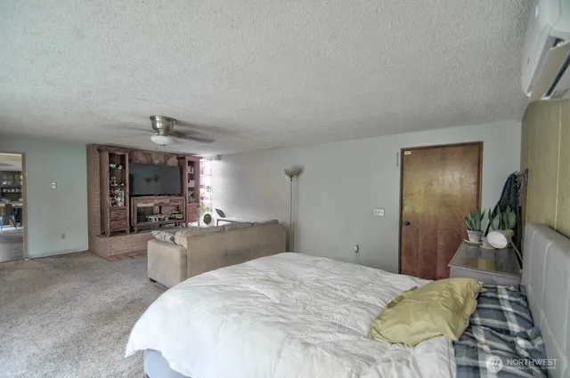 a bed room with a bed and furniture