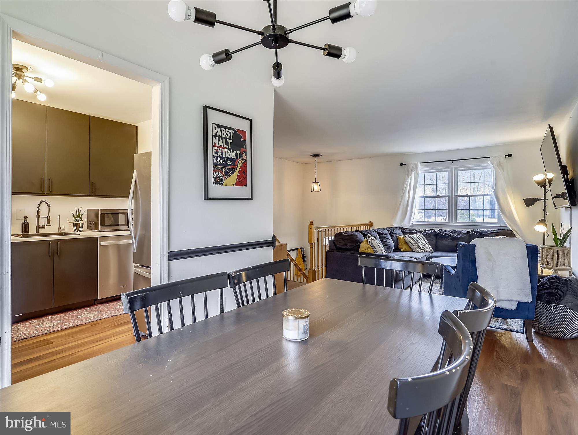 7838 East Shore Road Pasadena, MD 21122 - Photo 11 of 31 Dining room with on-trend lighting