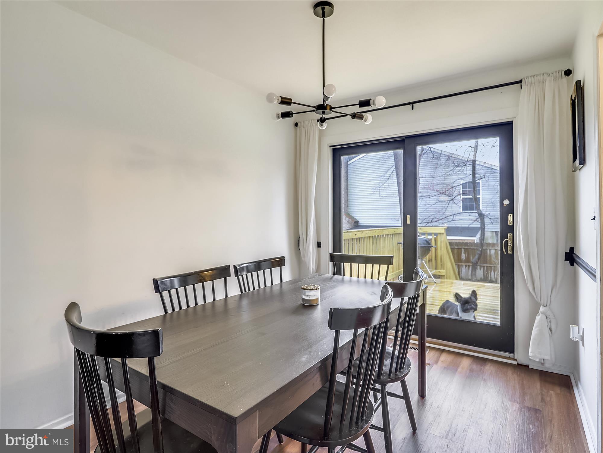 7838 East Shore Road Pasadena, MD 21122 - Photo 12 of 31 Dining room & door to the deck