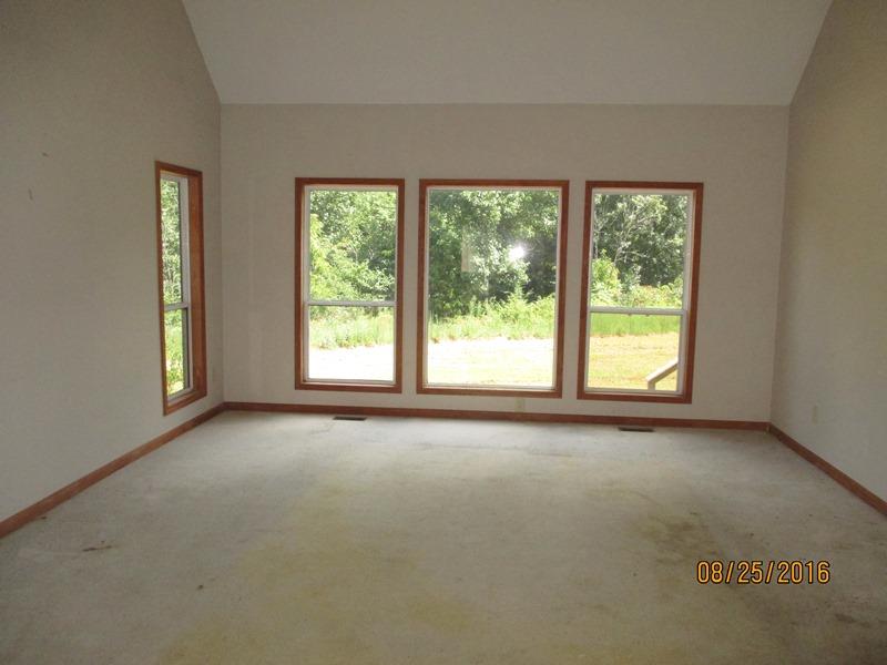 5101 Logan Road Cunningham, TN 37052 - Photo 4 of 8 an empty room with a window