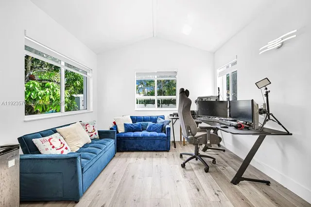 a living room with furniture and a window