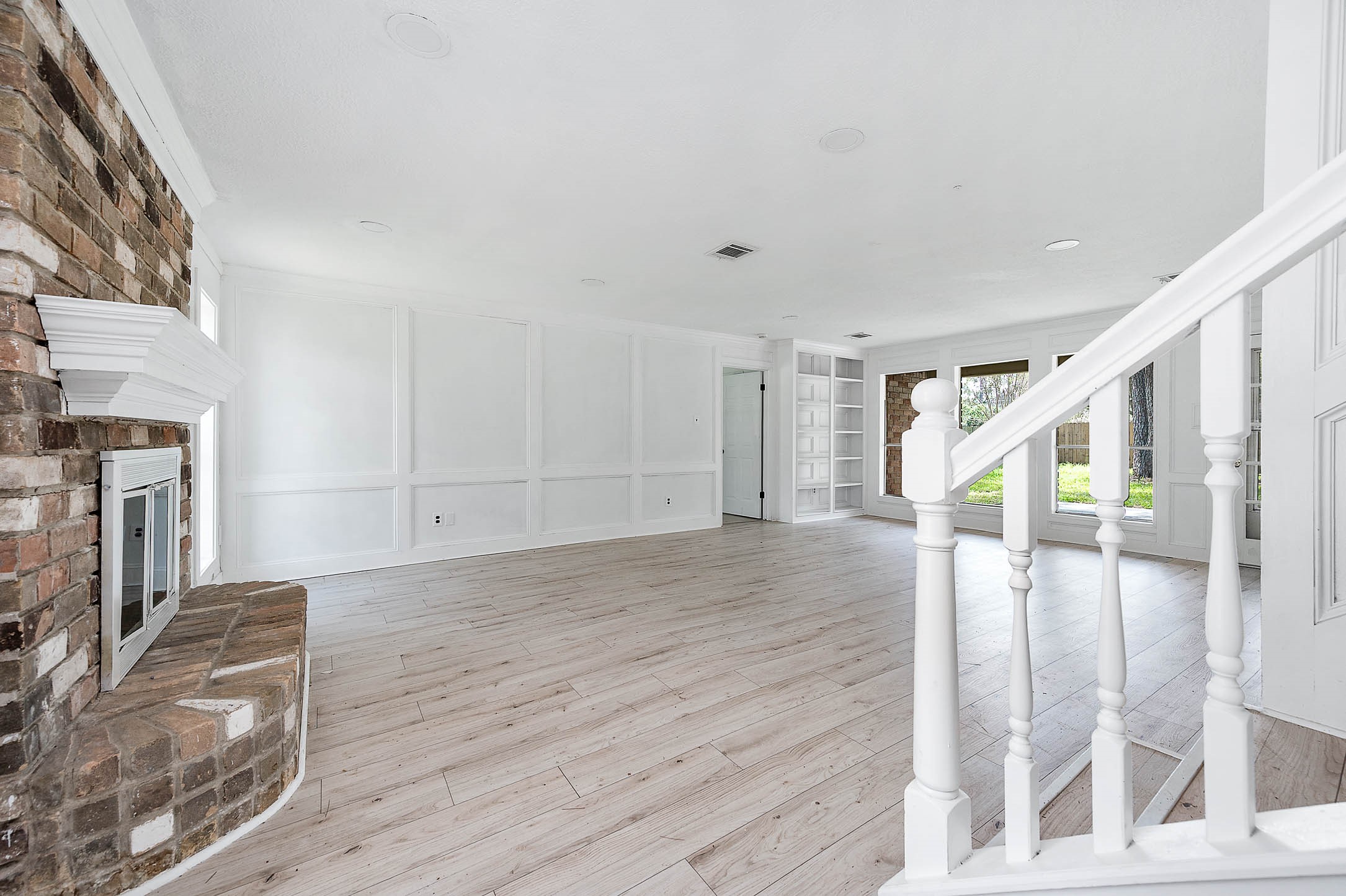 17627 Terrawren Lane Spring, TX 77379 - Photo 6 of 30 a view of a livingroom with wooden floor and staircase