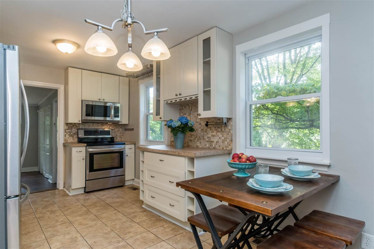 600 North King Charles Road Raleigh, NC 27610 - Photo 11 of 24 Natural light in kitchen with additional counter space/work area. Kitchen