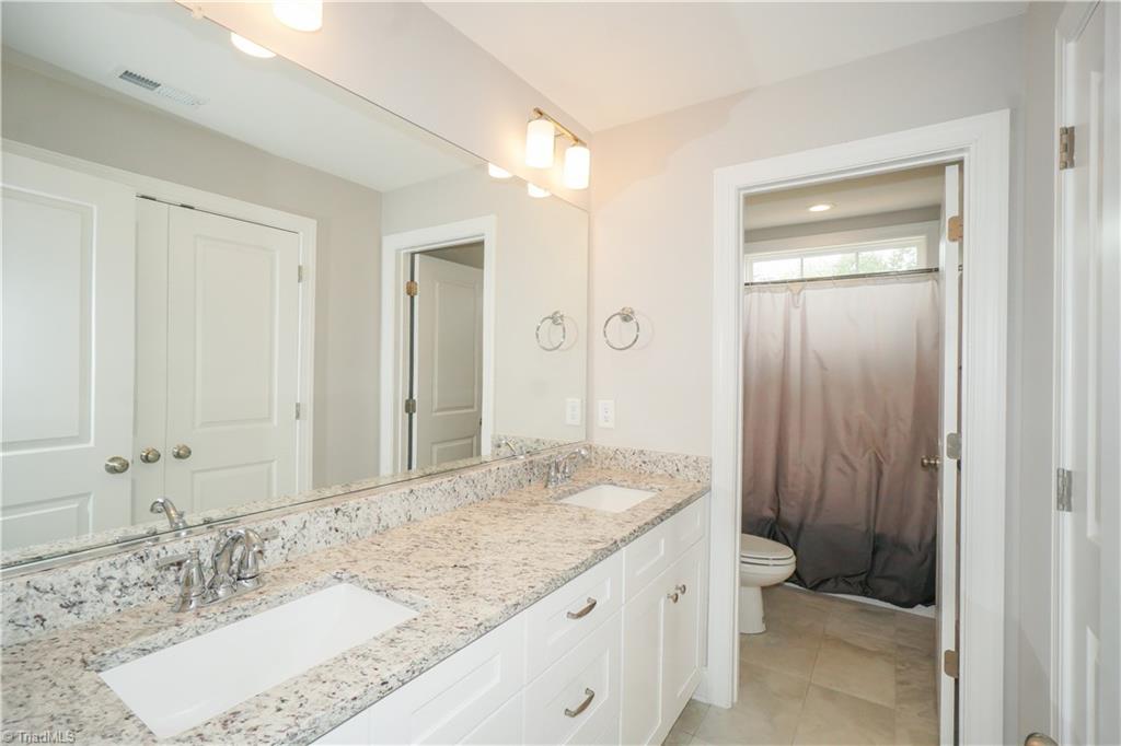 7096 Lambert Lake Road Stokesdale, NC 27357 - Photo 18 of 30 2nd bathroom with large linen closet