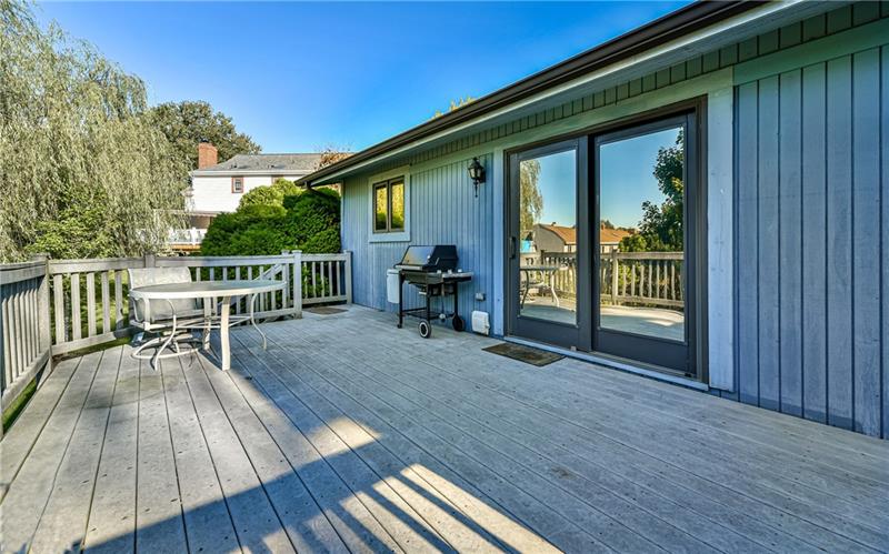 303 Ridgeway Drive Wexford, PA 15090 - Photo 21 of 21 Nice sized deck with steps to backyard and large sliding glass doors with access to both kitchen and family room.
