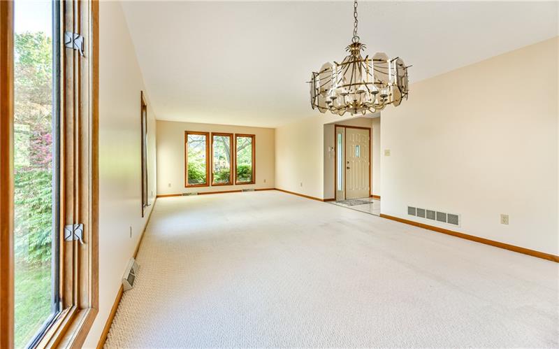 303 Ridgeway Drive Wexford, PA 15090 - Photo 4 of 21 Plenty of natural lighting through the many large windows in this huge combo living and dining room.