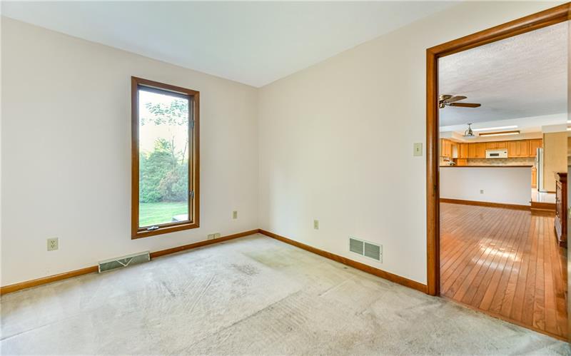 303 Ridgeway Drive Wexford, PA 15090 - Photo 10 of 21 Main level den with large window and scenic view of backyard.