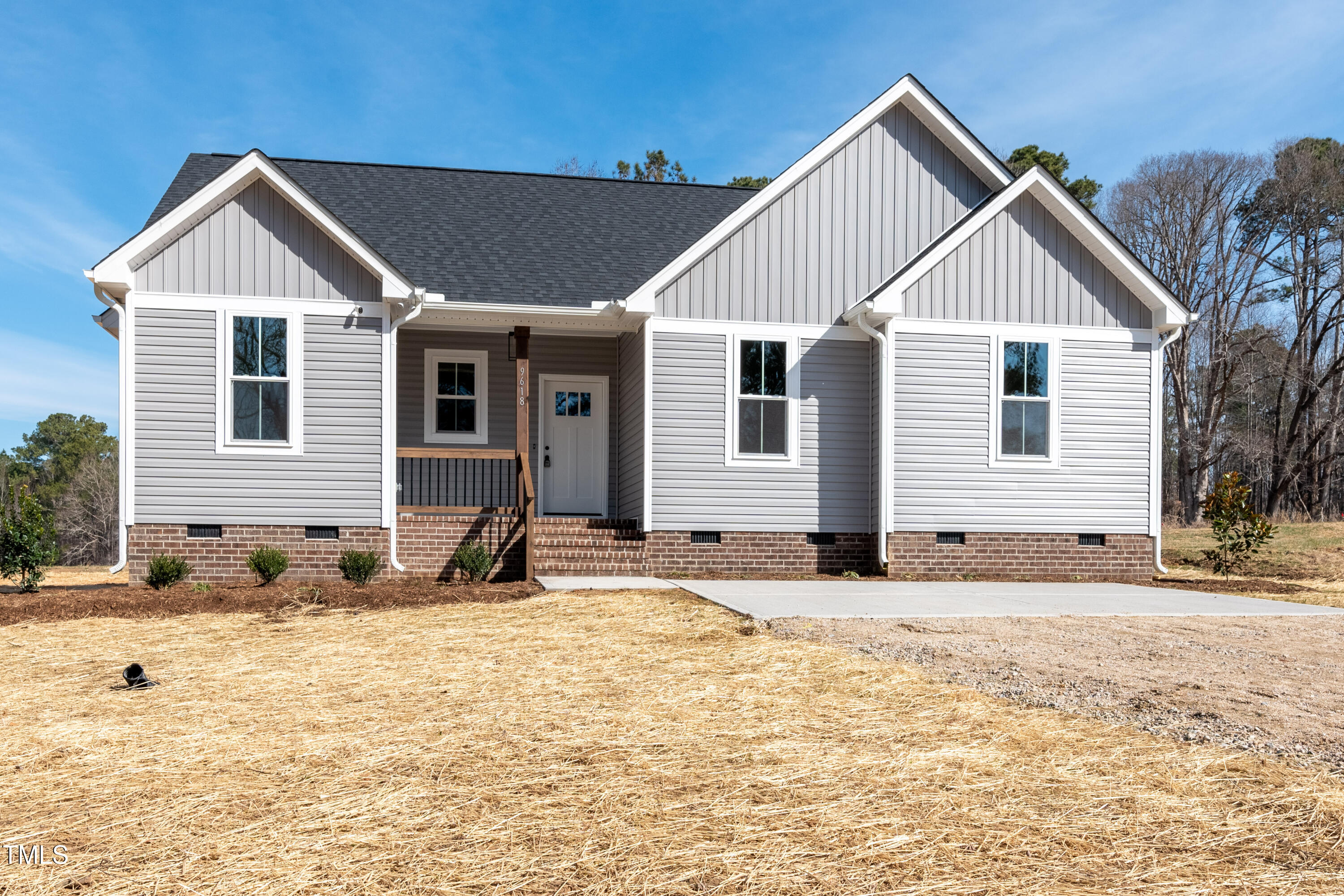9618 Stallings Road Spring Hope, NC 27882 - Photo 2 of 31 a front view of a house with a yard