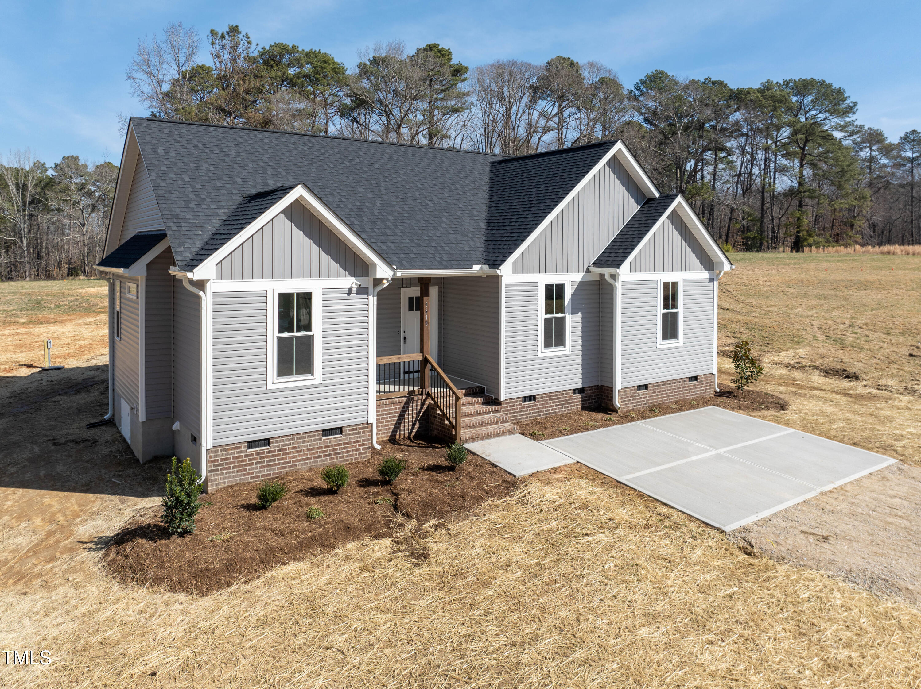 9618 Stallings Road Spring Hope, NC 27882 - Photo 4 of 31 a view of a house with a yard