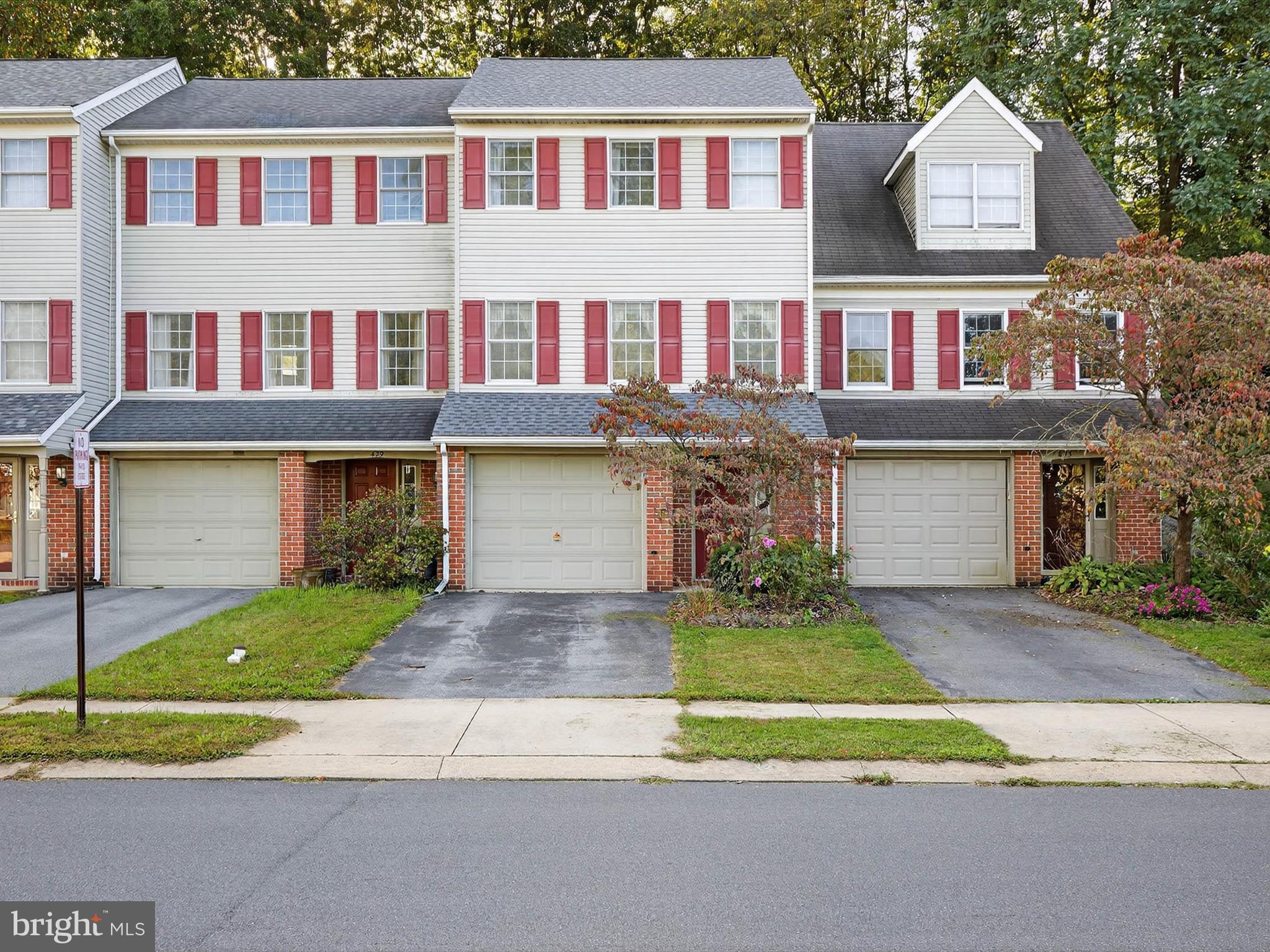 427 Crosswinds Drive Lititz, PA 17543 - Photo 1 of 33 a front view of residential houses with yard