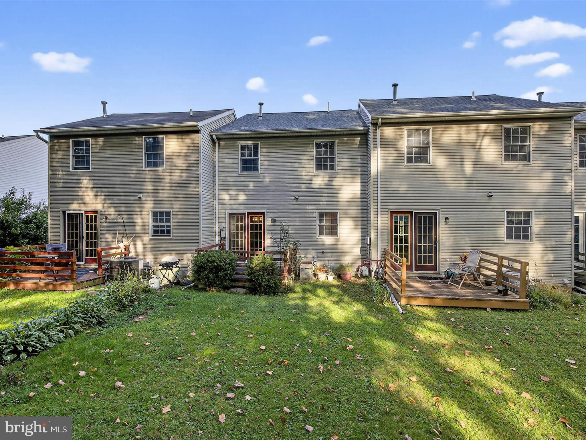 427 Crosswinds Drive Lititz, PA 17543 - Photo 30 of 33 a view of a house with backyard sitting area and garden