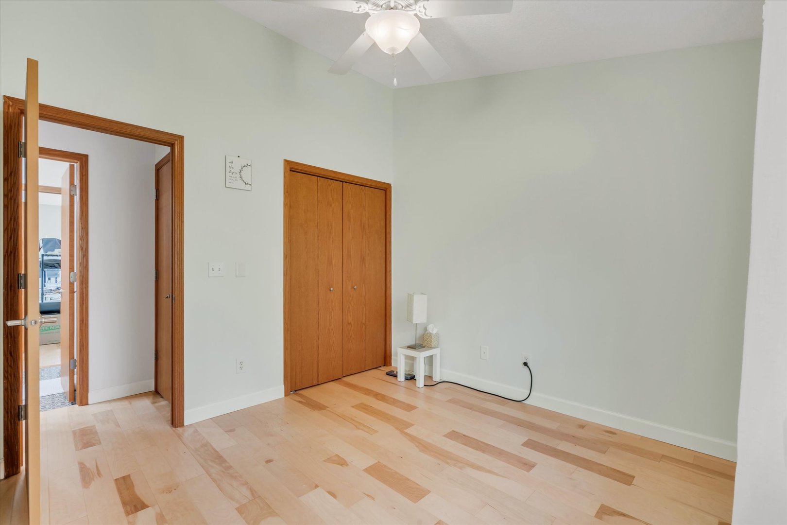 1223 33rd Ave Circle Silvis, IL 61282 - Photo 18 of 33 an empty room with a ceiling fan and closet area