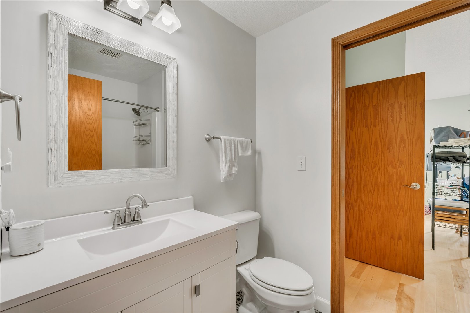 1223 33rd Ave Circle Silvis, IL 61282 - Photo 20 of 33 a bathroom with a sink a toilet and shower