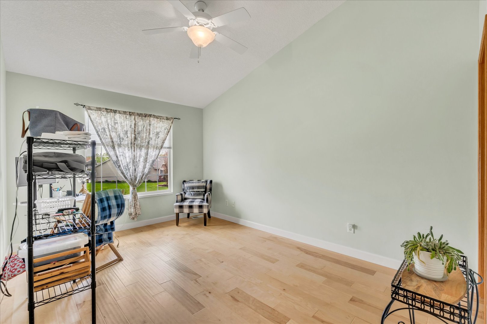 1223 33rd Ave Circle Silvis, IL 61282 - Photo 21 of 33 a living room with furniture and a flat screen tv