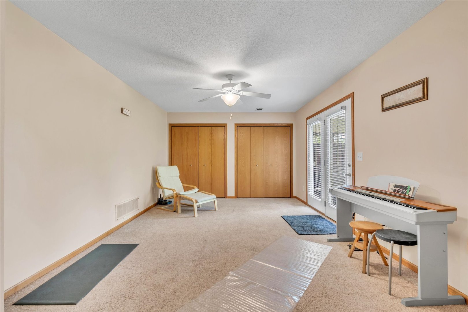 1223 33rd Ave Circle Silvis, IL 61282 - Photo 24 of 33 a living room with furniture and a chandelier