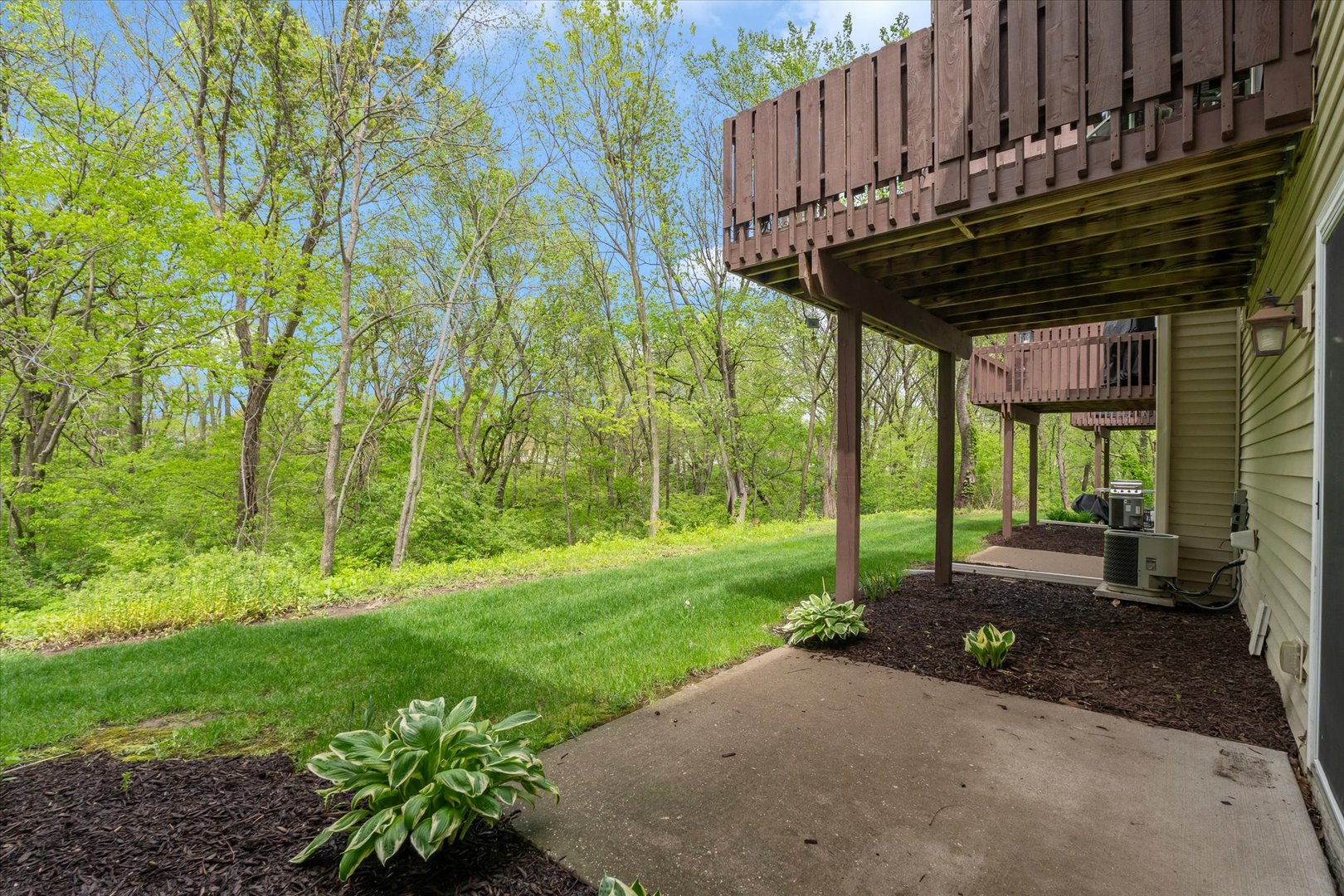 1223 33rd Ave Circle Silvis, IL 61282 - Photo 31 of 33 a backyard of a house with lots of green space
