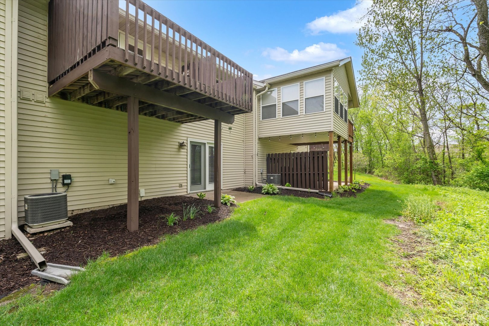 1223 33rd Ave Circle Silvis, IL 61282 - Photo 33 of 33 a view of a house with a backyard