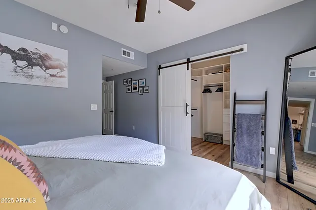 a bathroom with a double vanity sink mirror and double