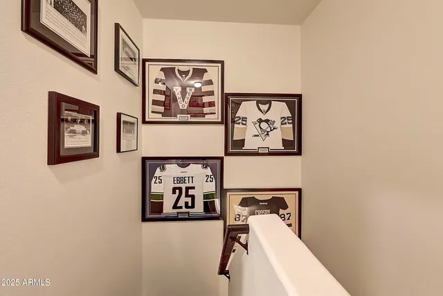 a view of a livingroom with furniture and natural light