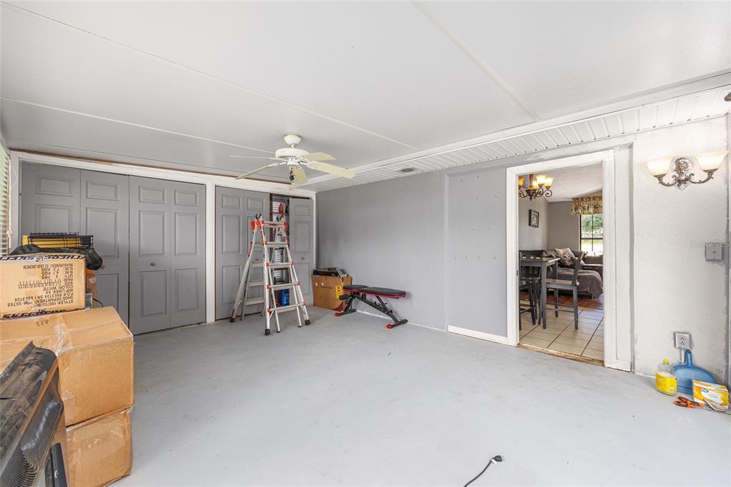 2227 Southwest 80th Avenue Ocala, FL 34481 - Photo 14 of 28 a view of a livingroom with furniture and storage
