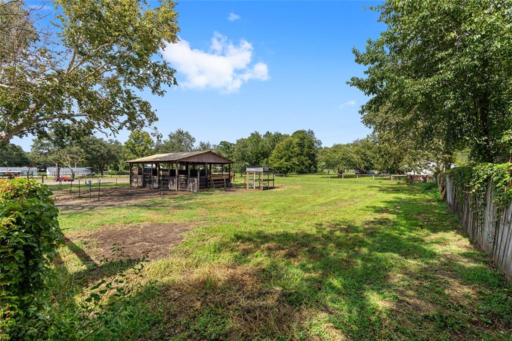2227 Southwest 80th Avenue Ocala, FL 34481 - Photo 22 of 28 a view of a house with a big yard