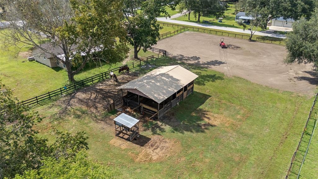 2227 Southwest 80th Avenue Ocala, FL 34481 - Photo 27 of 28 a view of a small yard with wooden fence