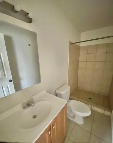 an empty room with a bench