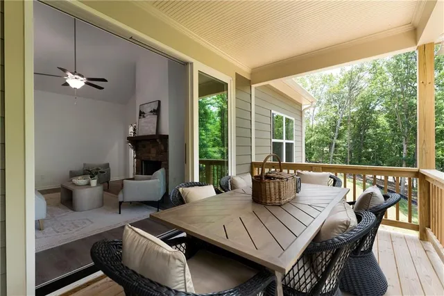 a outdoor space with patio the couches and dining table with garden view