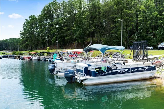 a roof deck view with a lake view