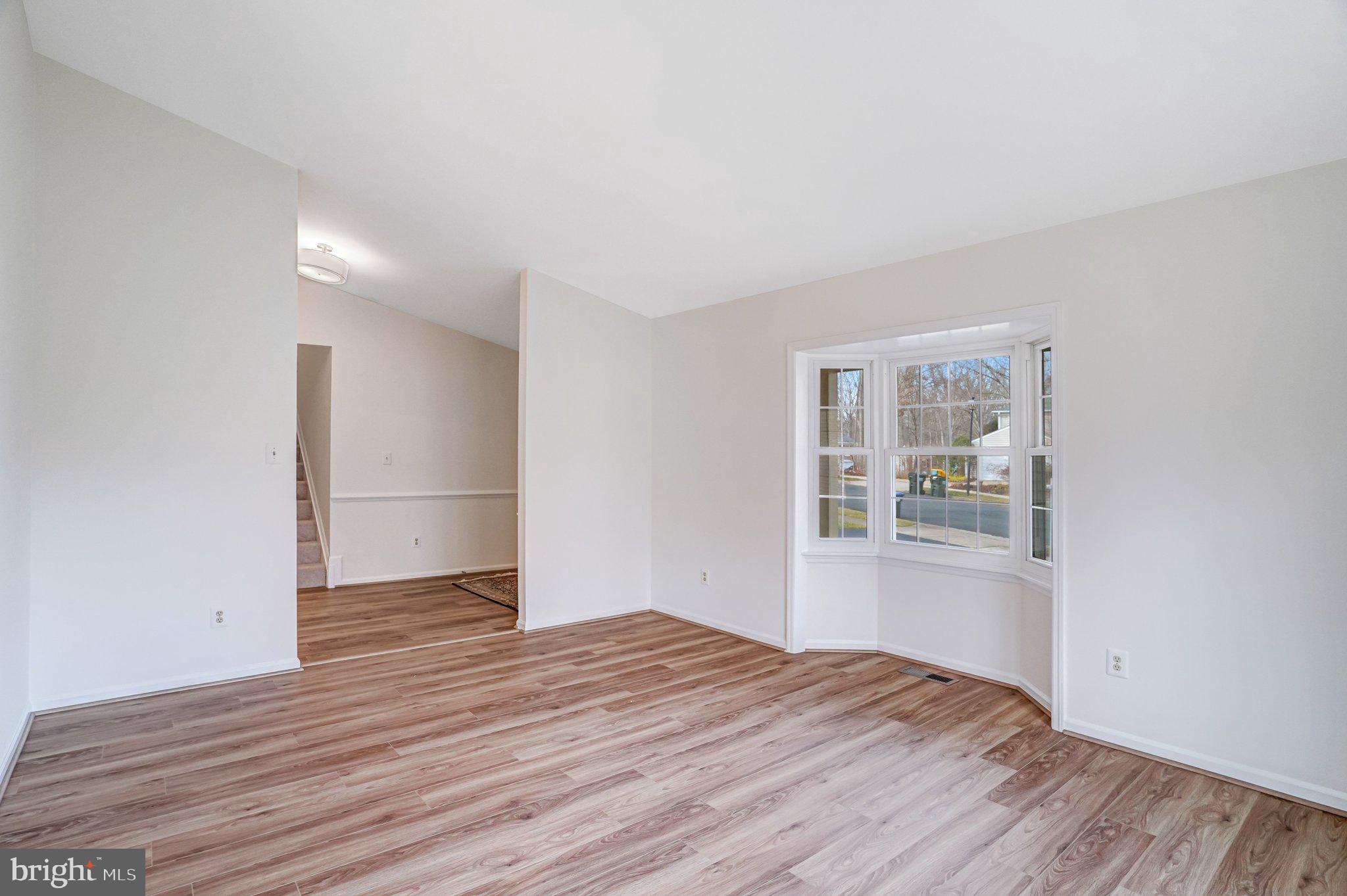 9019 Octavia Court Springfield, VA 22153 - Photo 16 of 54 Living room looking into foyer