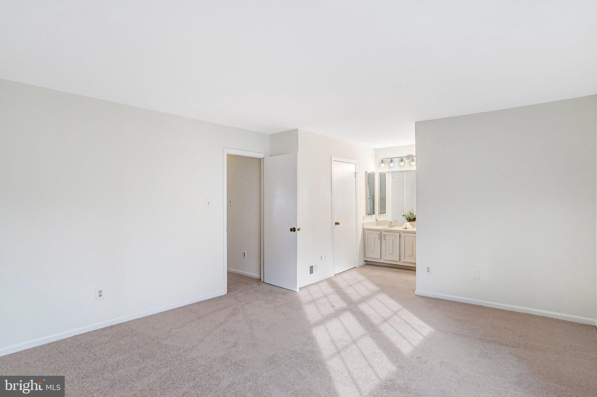 9019 Octavia Court Springfield, VA 22153 - Photo 20 of 54 Primary bedroom with walk-in closet