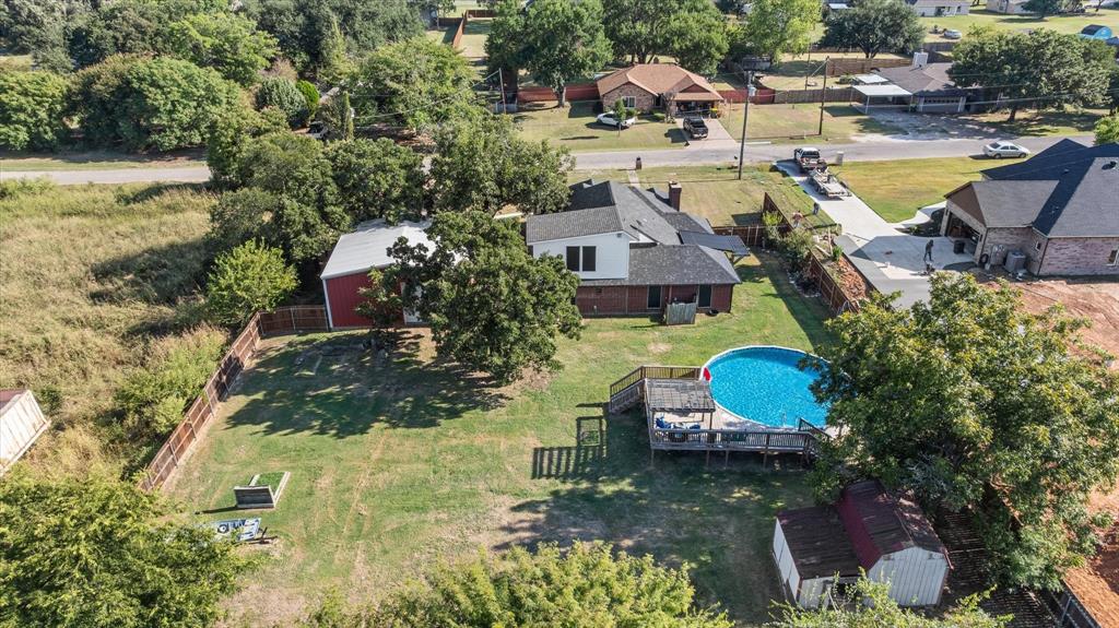 614 Overhill Road Granbury, TX 76048 - Photo 39 of 40 an aerial view of a house with swimming pool and outdoor space