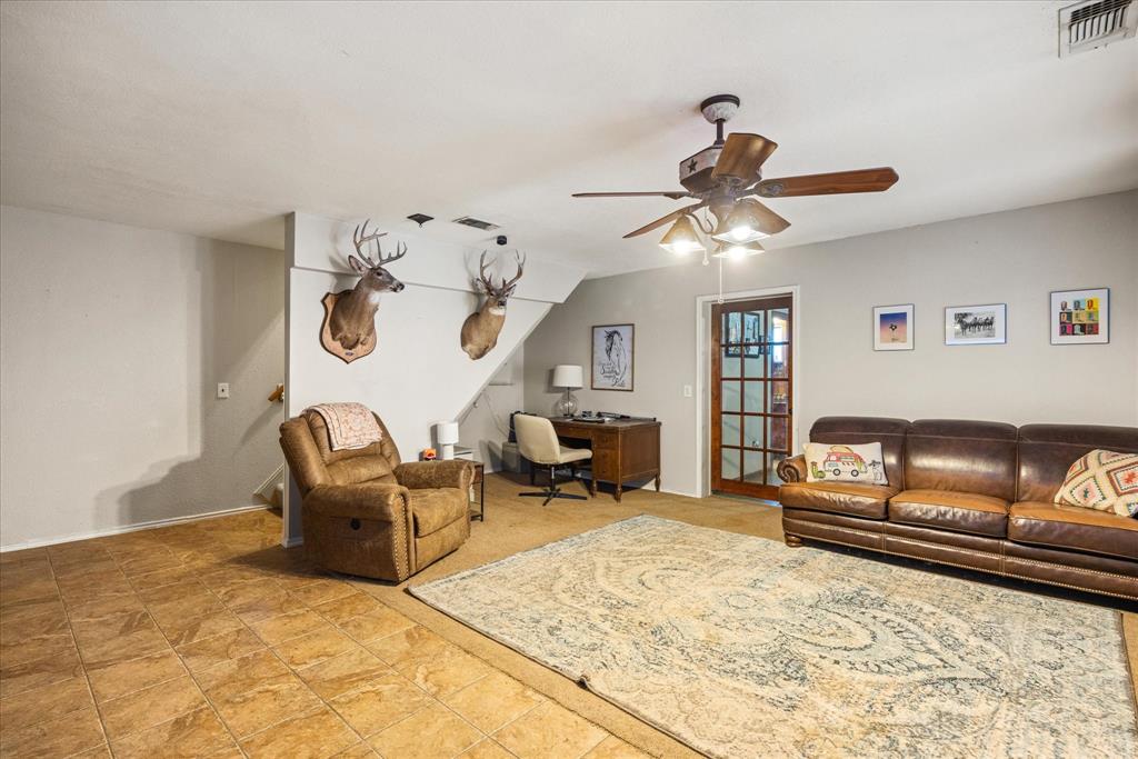 614 Overhill Road Granbury, TX 76048 - Photo 4 of 40 a living room with furniture
