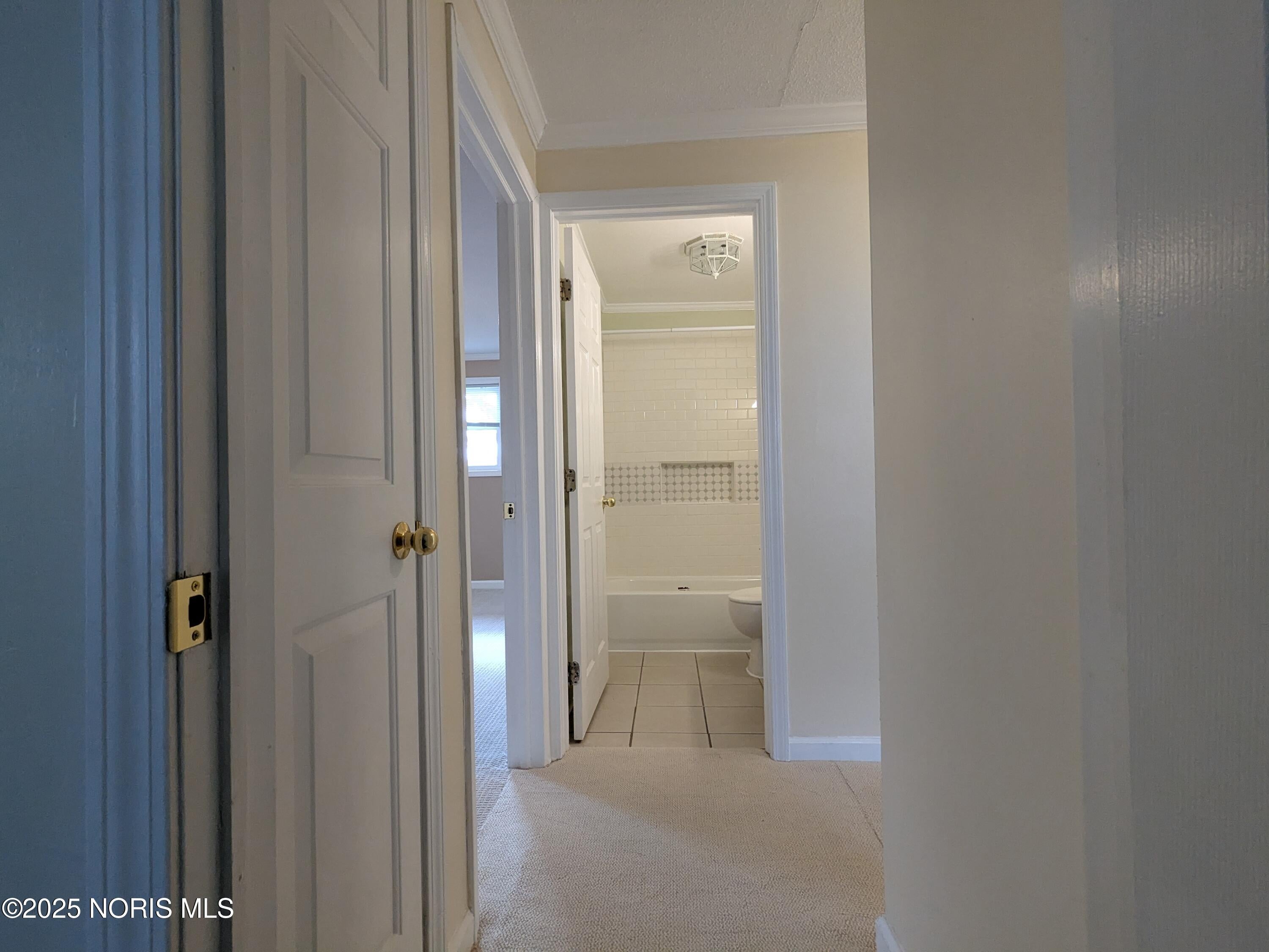1715 Ralvan Drive Defiance, OH 43512 - Photo 33 of 49 Hall to bathroom