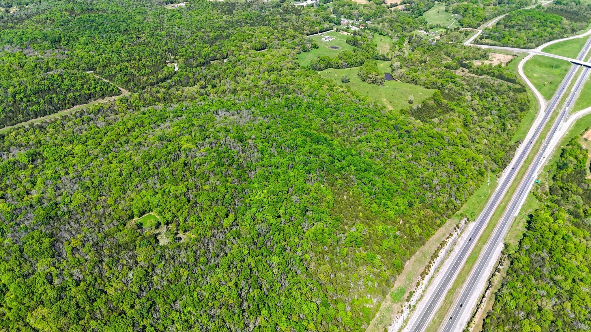 9147 Spantown Road Arrington, TN 37014 - Photo 6 of 15 a view of a yard from a window