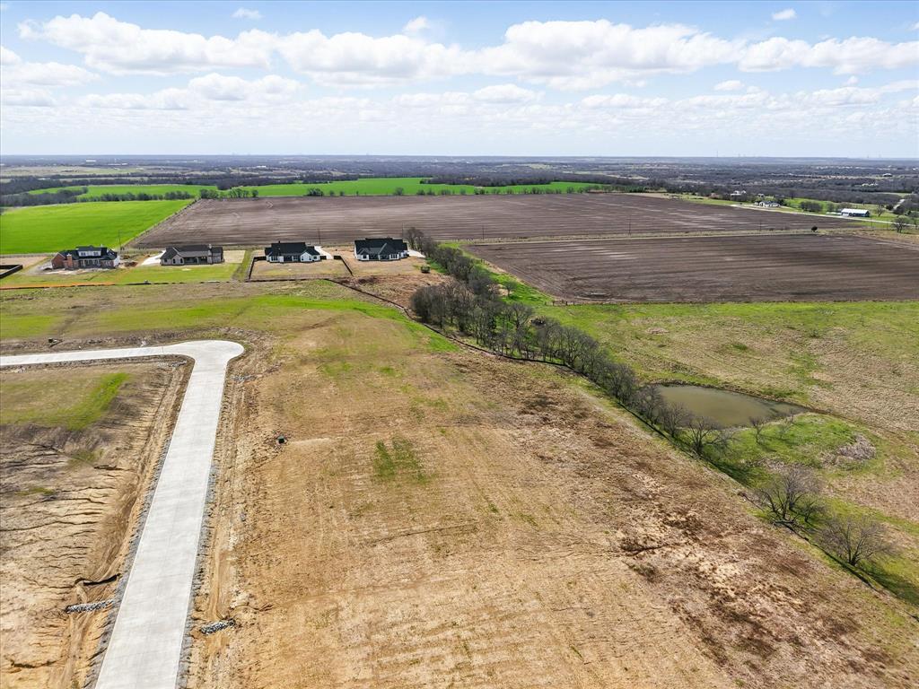 Tbd Tbd Byrum Crossing Venus, TX 76084 - Photo 7 of 18 a view of a lake with a big yard