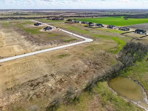 a view of a swimming pool and an outdoor space