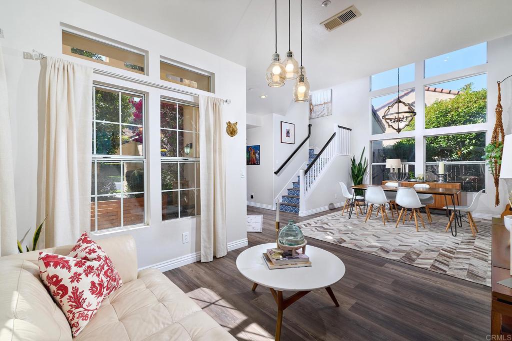 2414 Fallbrook Place Escondido, CA 92027 - Photo 26 of 63 a view of a dining room with furniture window and wooden floor