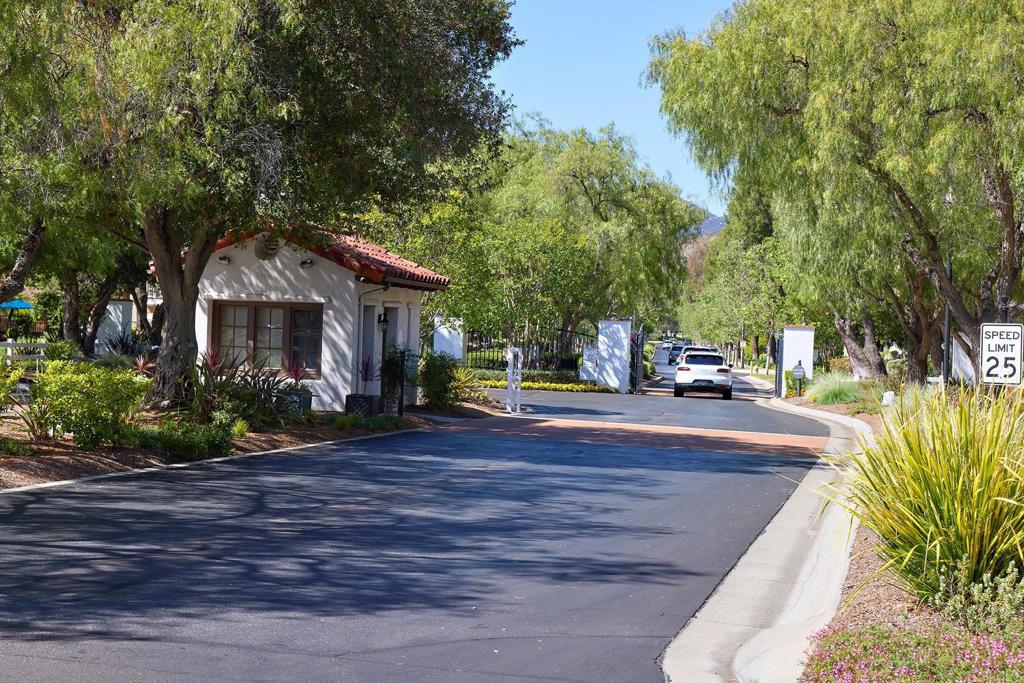 2414 Fallbrook Place Escondido, CA 92027 - Photo 48 of 63 a front view of a house with a yard