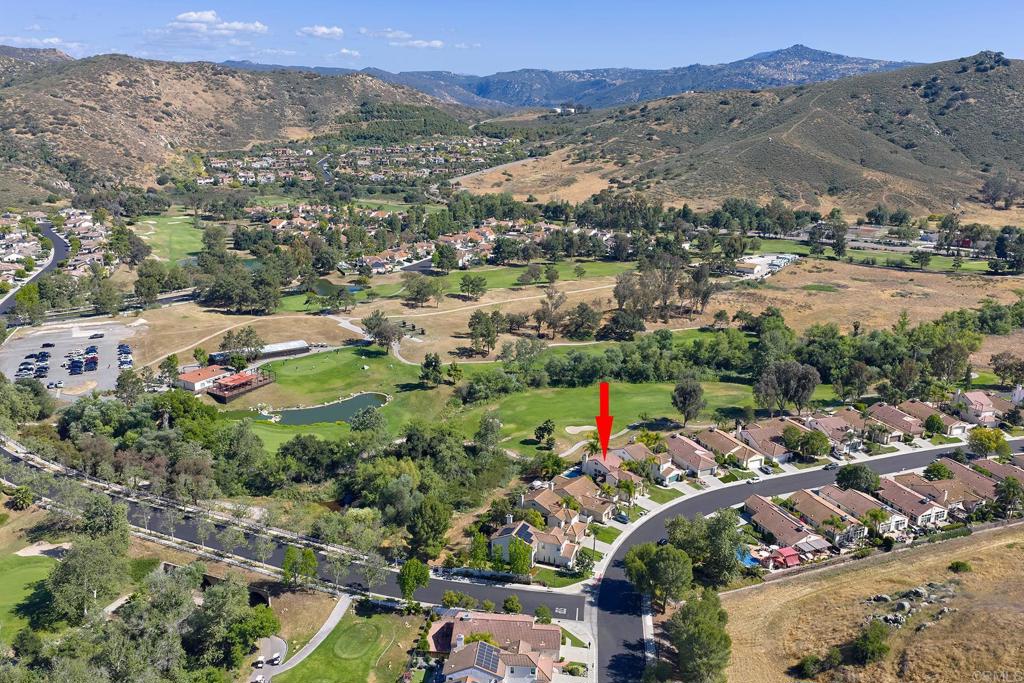 2414 Fallbrook Place Escondido, CA 92027 - Photo 54 of 63 an aerial view of a city with lots of residential buildings