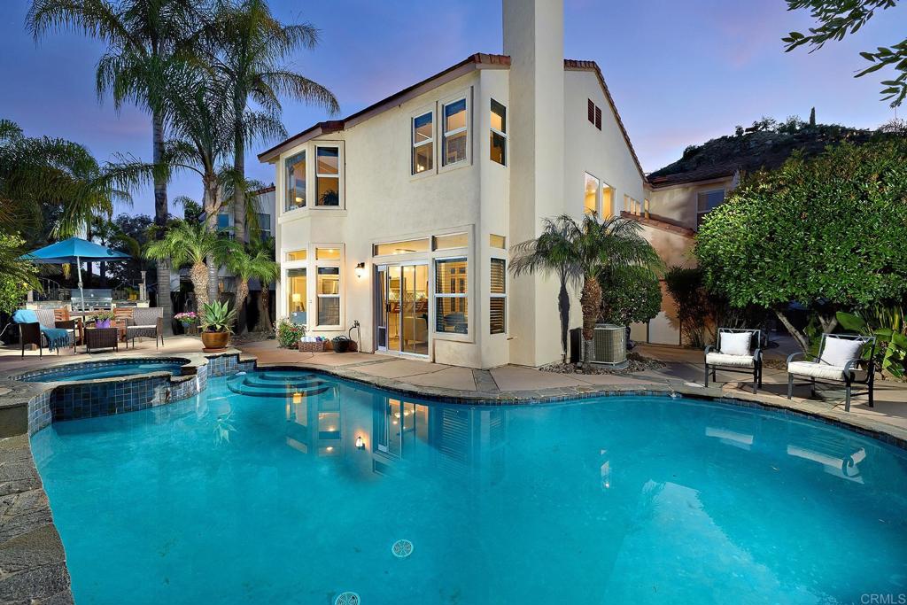 2414 Fallbrook Place Escondido, CA 92027 - Photo 8 of 63 a view of a house with swimming pool and sitting area