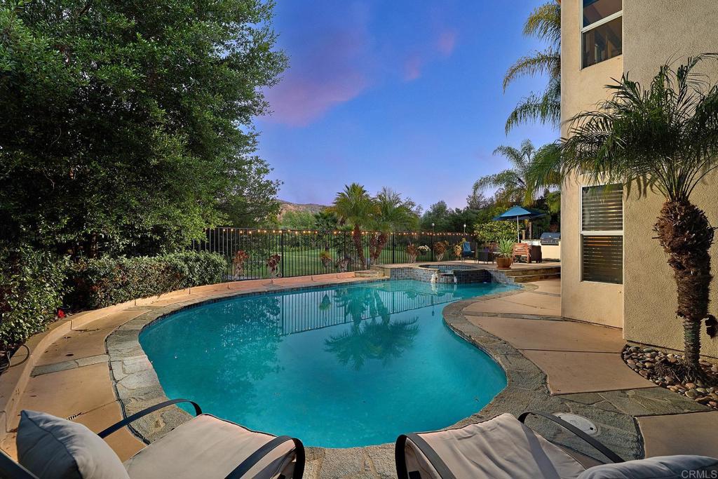2414 Fallbrook Place Escondido, CA 92027 - Photo 9 of 63 a view of a swimming pool with a patio