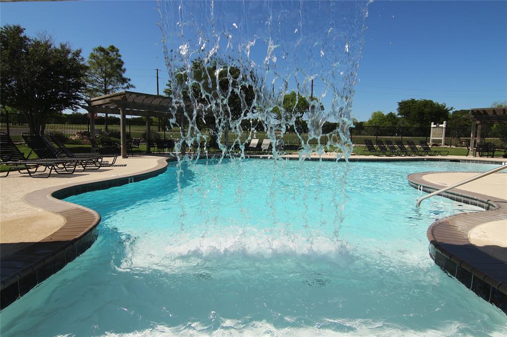 10057 Bluffview Court Whitney, TX 76692 - Photo 26 of 27 a view of a swimming pool with a patio