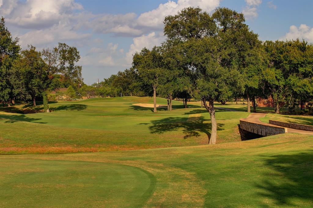 10057 Bluffview Court Whitney, TX 76692 - Photo 9 of 27 a view of a swimming pool with an outdoor space and seating area