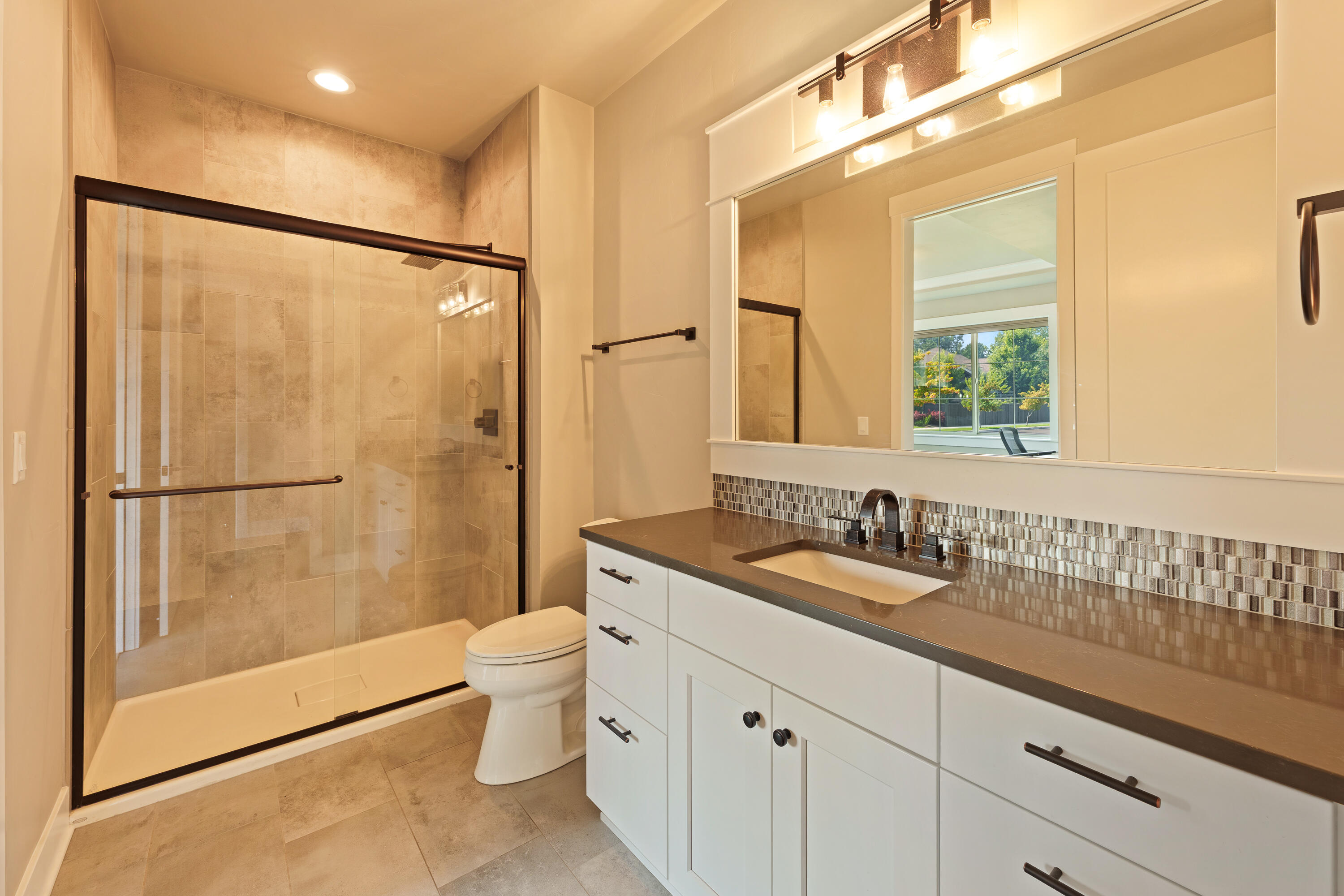 60869 Southwest Headwaters Loop Bend, OR 97702 - Photo 32 of 50 Guest suite bathroom with separate entrance to hallway