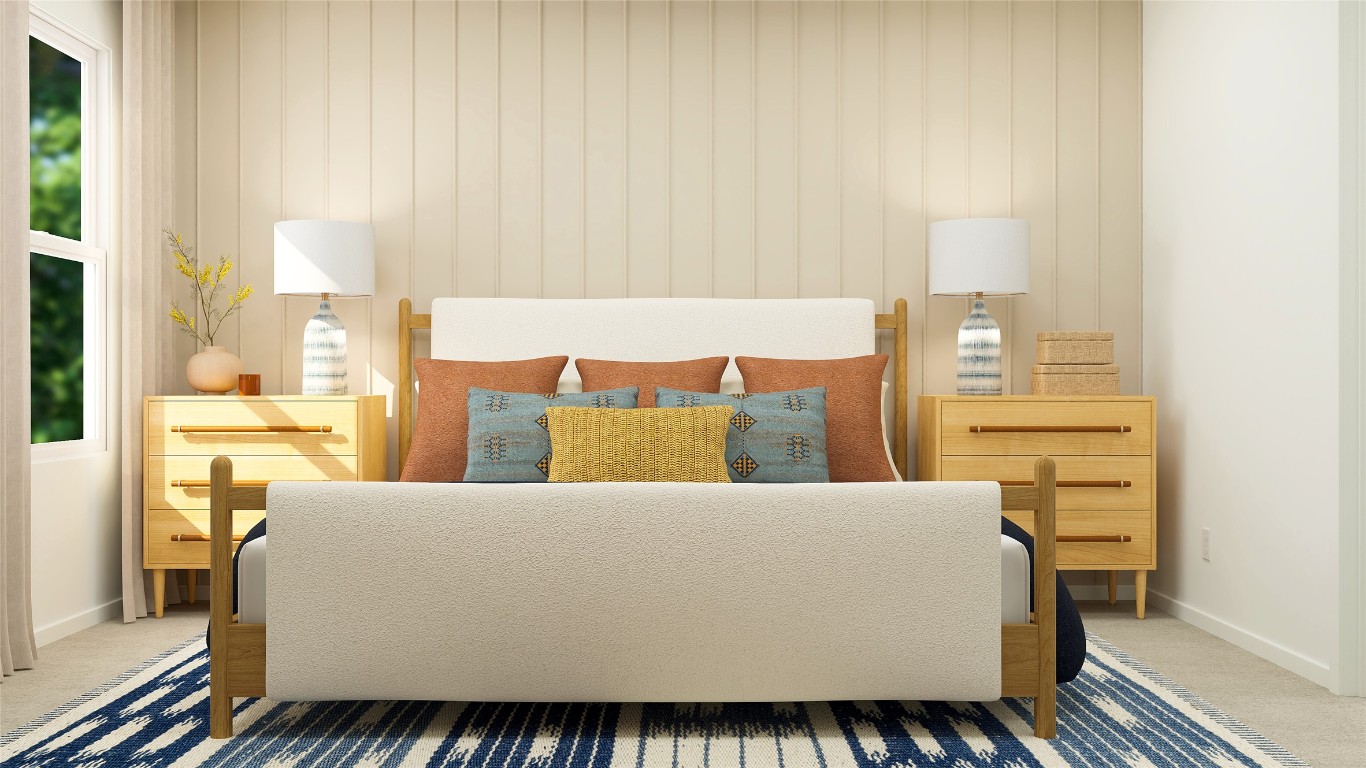 103 Heritage Grvs Road Bertram, TX 78605 - Photo 35 of 37 a bed sitting in a bedroom next to a lamp