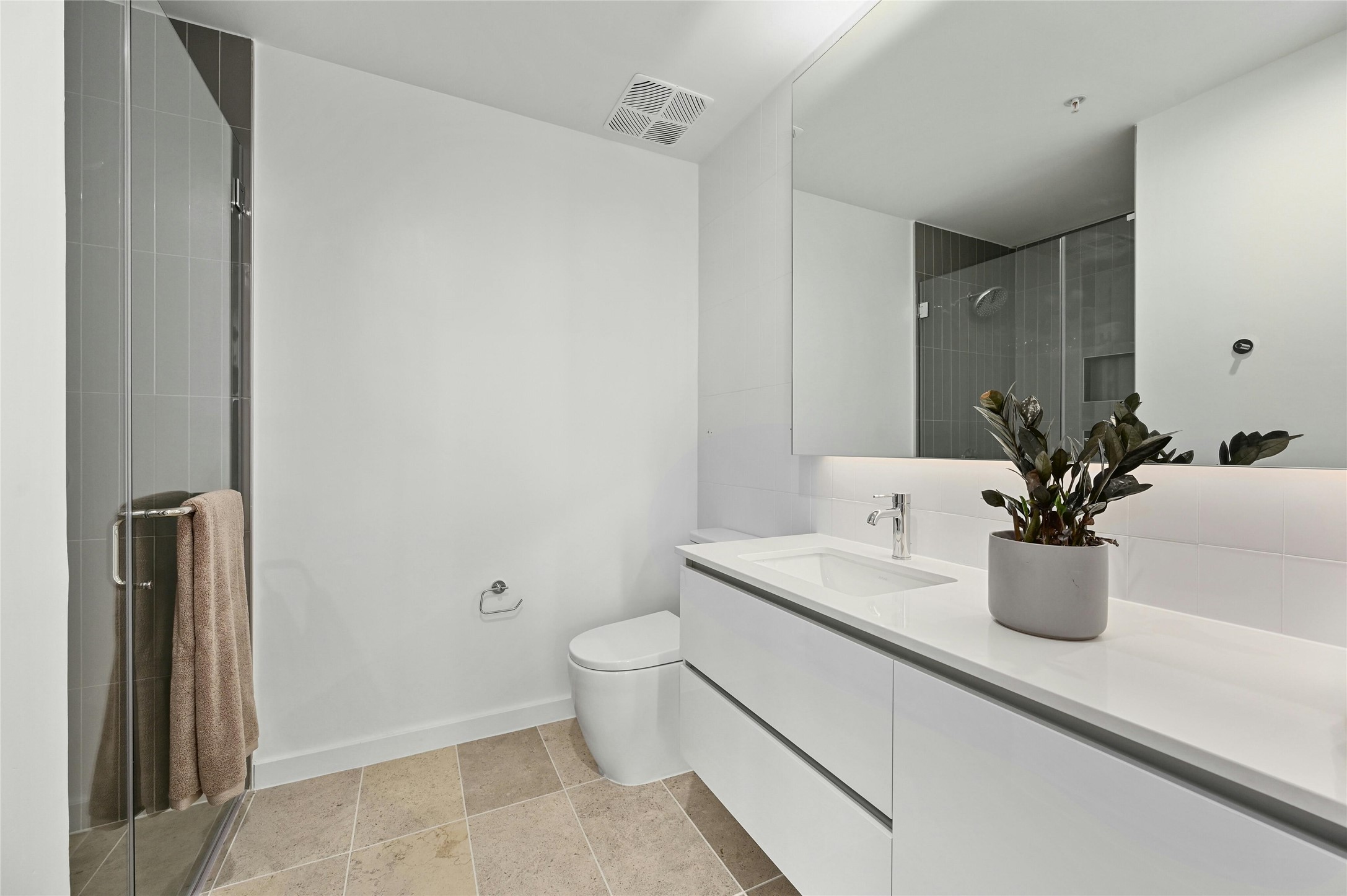 313 West 17th Street, Unit 1807 Austin, TX 78701 - Photo 13 of 39 Third bathroom is a sleek full bath with a walk-in shower, modern vanity and contemporary finishes. Conveniently located next to the den and the second & third bedrooms.